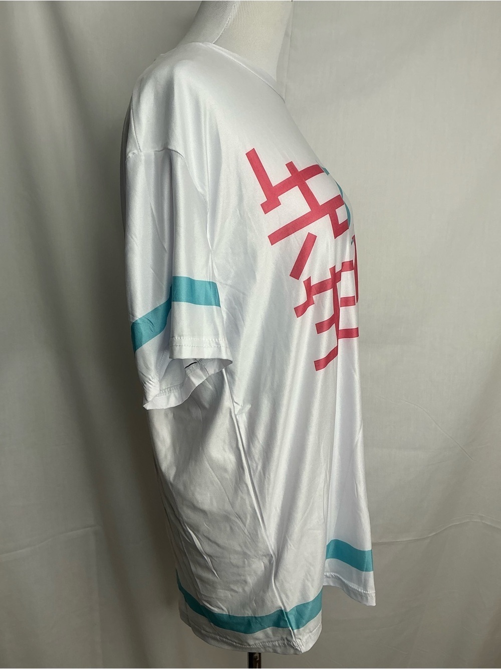 2124 - White Short-Sleeve Men’s Graphic Tee with Teal and Pink Accents - Picture 3 of 5